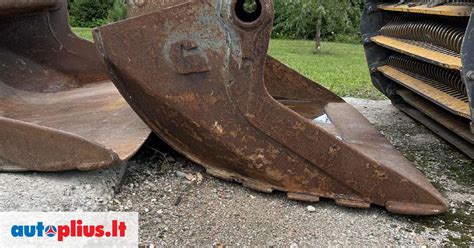 įvairūs kaušai statybinėms mašinoms