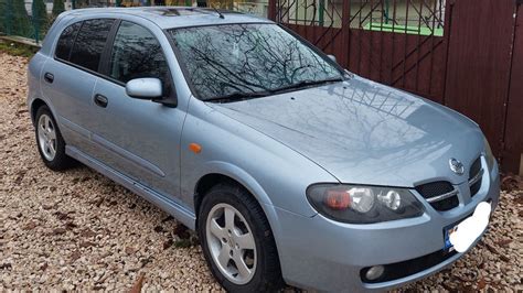 Nissan Almera N16 interjero nuotrauka, demonstruojanti prietaisų skydelį ir sėdynes