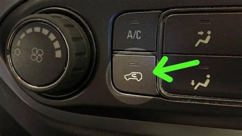 automobilio AC mygtukas