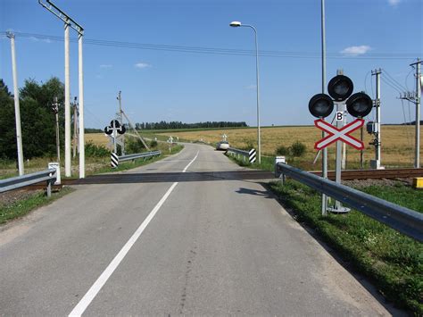 Geležinkelio pervažos su signalizacija ir užtvarais