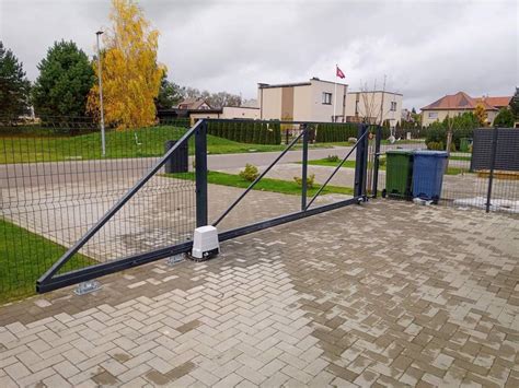 schematinis kiemo vartų automatikos išdėstymas