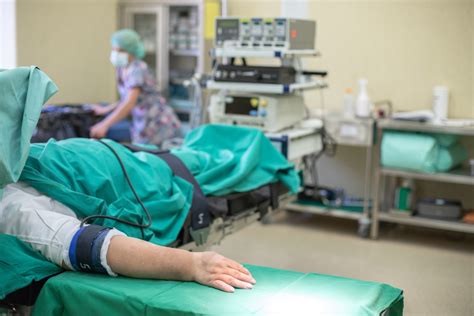 Tematinė nuotrauka: gydytojas ir pacientas medicininės apžiūros metu