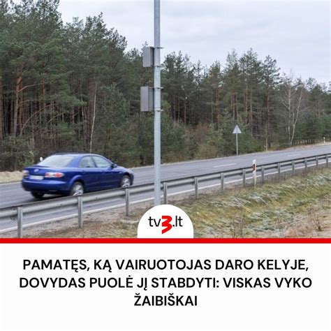 Vairuotojas daro pertrauką prie kelio