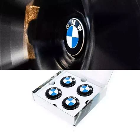 Įvairūs BMW ratlankių dangteliai ir emblemos