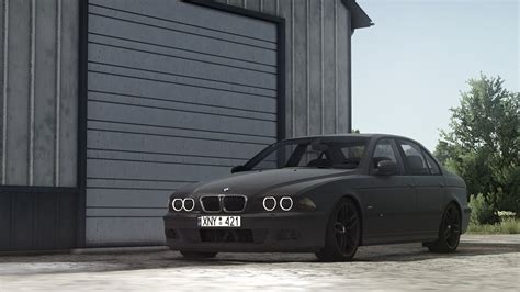 BMW E39 modelio bendras vaizdas, iliustruojantis elegantišką dizainą