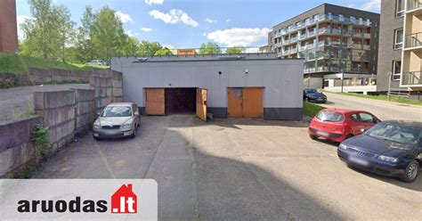 Kauno taksi parko septynaukštis garažas su spiralinėmis estakatomis