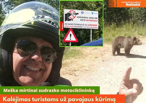 Motociklininkas dėvintis visą apsauginę įrangą