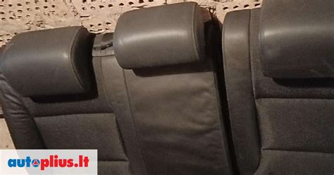 Schema, kaip atlenkti galinės sėdynės atlošą Audi A3