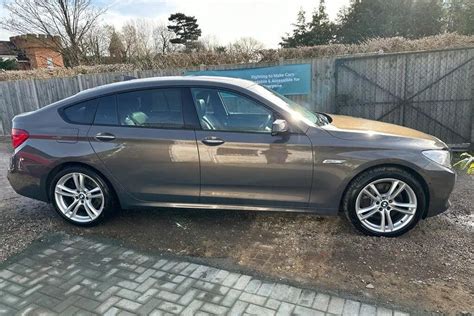 BMW 5 Serijos Gran Turismo (F07) salono nuotrauka su atlenktomis sėdynėmis