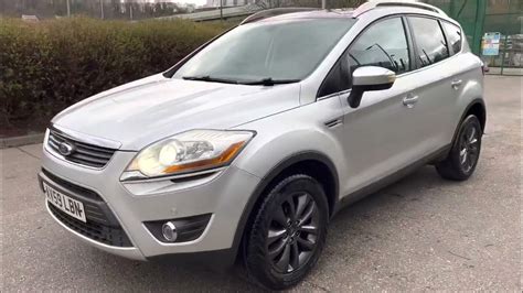 Ford Kuga 2009 Titanium įrangos lygio emblemą