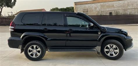 Toyota Land Cruiser 120 interjeras su navigacijos sistema
