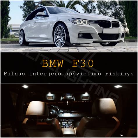 BMW E60 interjero detalė su senesnio tipo navigacijos ekranu
