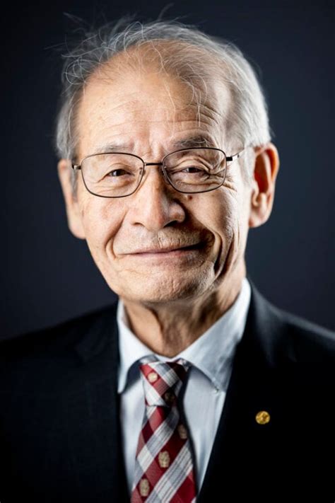 Istorinė nuotrauka su Stanley Whittingham, Johnu B. Goodenoughu ir Akira Yoshino
