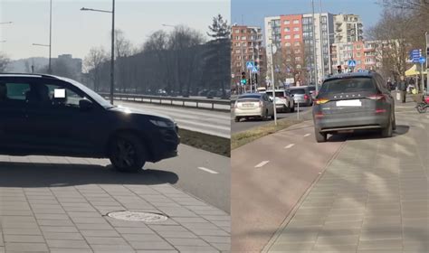 Du automobiliai atbulomis važiuoja vienas į kitą parkavimo aikštelėje