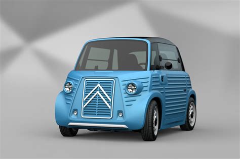 Citroën 2CV važiuojantis per nelygų kaimo kelią