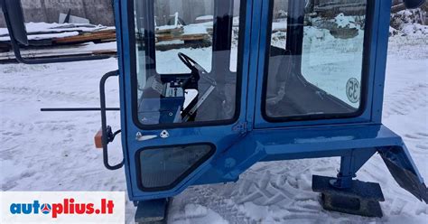 MTZ traktoriaus kabina su modifikuotu prietaisų skydeliu