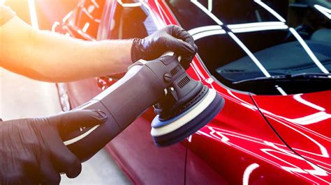 Thematic photo of a car being waxed, shiny surface