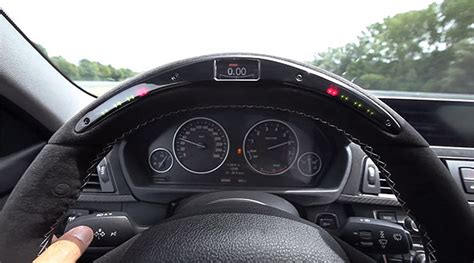 BMW M Performance interjero detalės - vairas, pavarų perjungimo svirtelės ir kilimėliai
