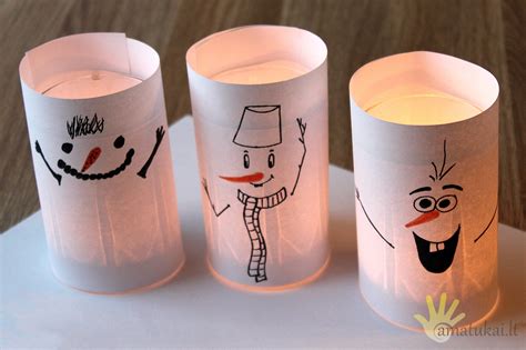 Advento žibintas iš kepimo popieriaus su iškirptais ornamentais