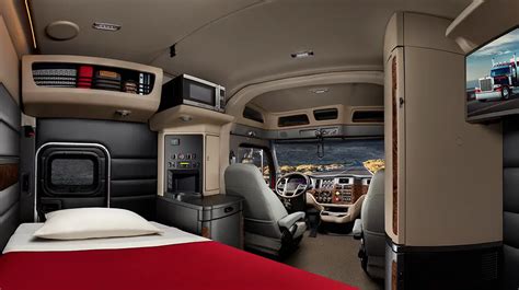 Interior of Peterbilt 579 cabin showing dashboard and sleeper area