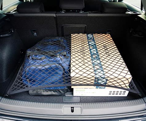 automobilio bagažinės tinklo sistema su tvirtinimais