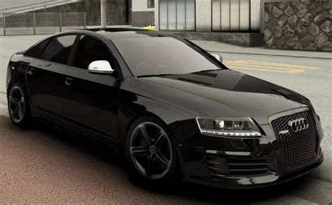 Teminė nuotrauka: Audi A6 C6 važiuojantis keliu, demonstruojantis stabilumą ir saugumą