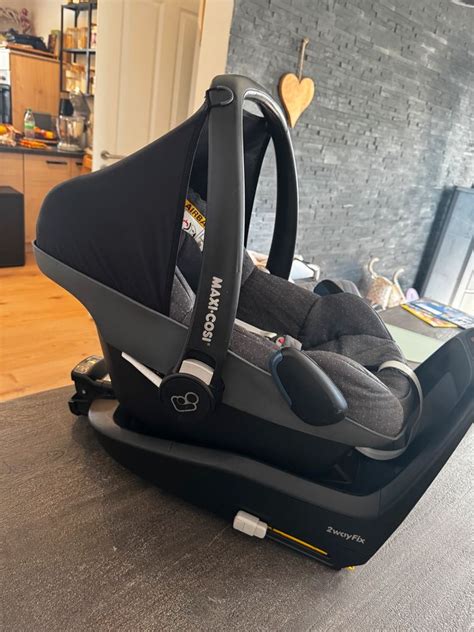 Maxi-Cosi 2wayFix bazės montavimo schema