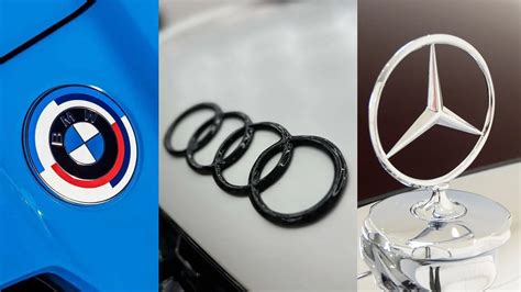 Mercedes-Benz ir BMW logotipai su vaivorykštės spalvomis