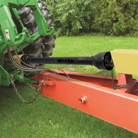 Tractor with a PTO shaft connected to an agricultural implement