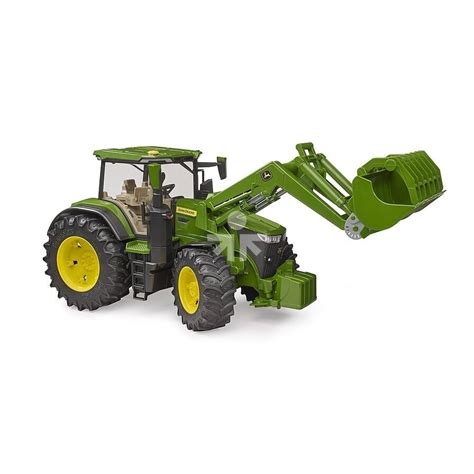 John Deere traktorius su sumontuotais galinių ratų svoriais dirbantis lauke