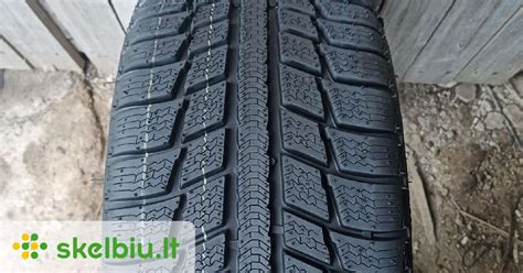 schematinis restauruotos padangos pjūvis, pavaizduojantis seną karkasą ir naują protektorių