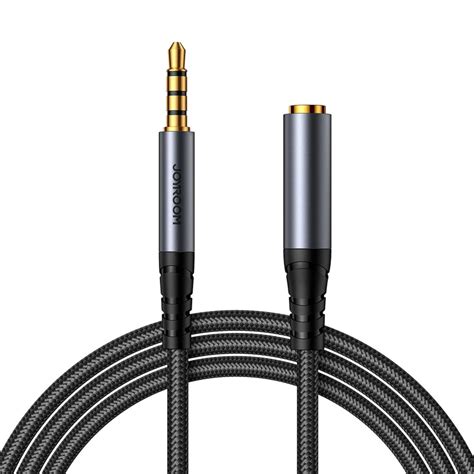 schema: 3,5 mm garso kabelio jungtis ir AUX įvesties lizdo vieta automobilio konsolėje