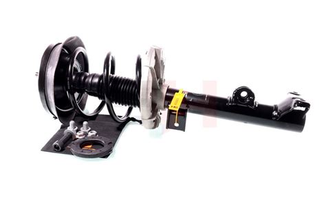 nuotrauka, kurioje matomas automobilio pakabos elementas - amortizatoriaus statramstis su atramine guolio vieta