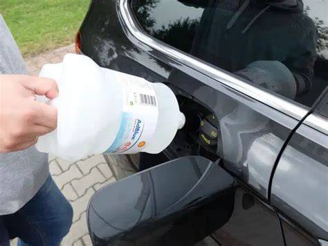 AdBlue bakelio vieta ir įpylimo angos žymėjimas
