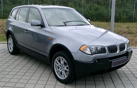 Schema, kaip atrodo garsiakalbių išdėstymas BMW X3 E83