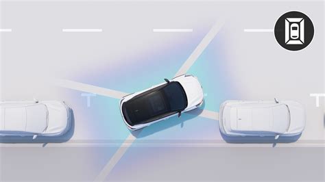 Volvo ekrano vaizdas su statymo pagalbos sistemos simboliais ir atstumais iki kliūčių