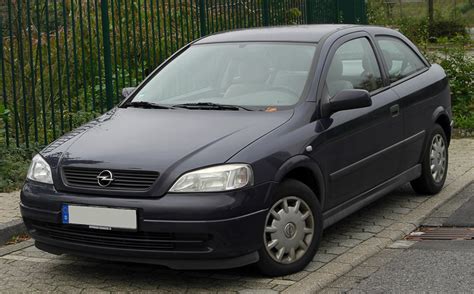 Opel Astra G saugiklių dėžutės vietos schemos