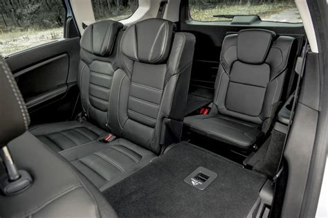 Interior photo of Renault Grand Scenic 2011 showing flexible seating and storage