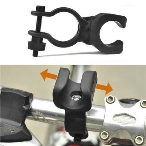 Universalus dviračio žibinto laikiklis, pritvirtintas prie vairo