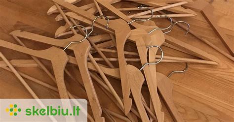 Informatyvinė grafika, iliustruojanti įvairias pakabos detales ir jų restauraciją