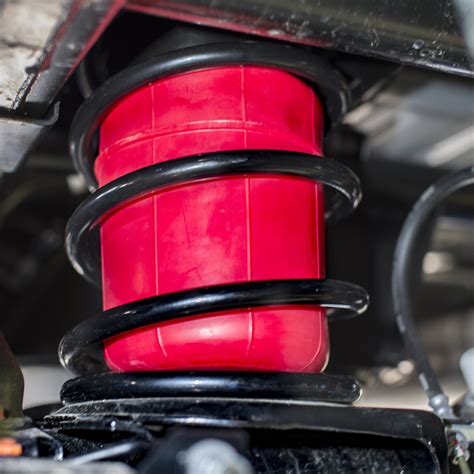 Infographic showing the structure and benefits of reinforced air springs in a commercial vehicle