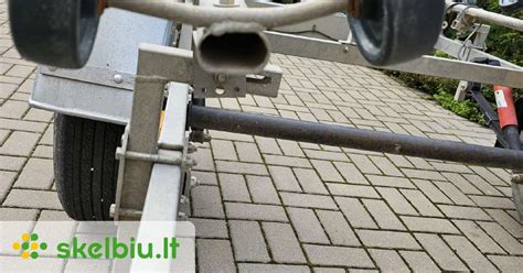 schematinis brėžinys, iliustruojantis skirtingus krovinių tvirtinimo būdus ant priekabos