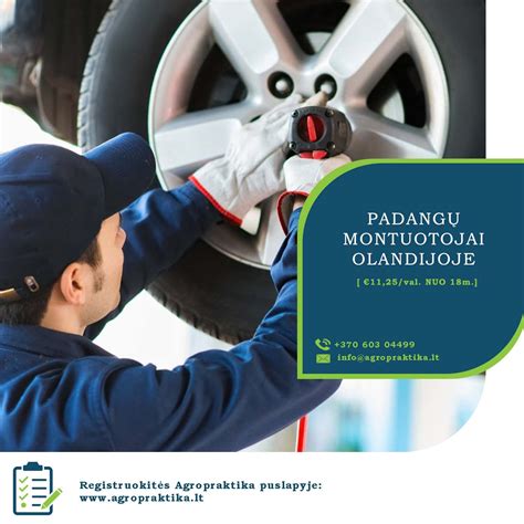 Automobilių serviso darbuotojai prie premium klasės automobilių Anglijoje