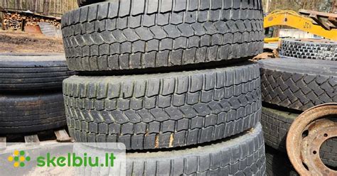 Vaizdinis elementas: Skirtingų markių sunkvežimių padangos ir ratlankiai.